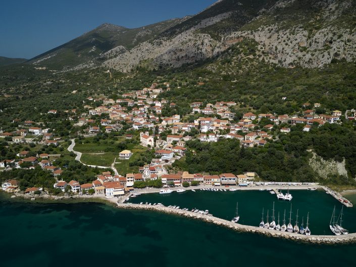 Aerial photgraphy capturing tne harbour on the island of Kalimos in Greece.