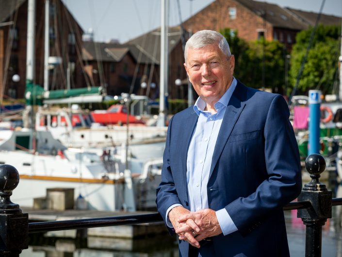Alan Johnson, Viola Trust patron, photographed for an editorial magazine alongside the marina in Hull, East Yorkshire.