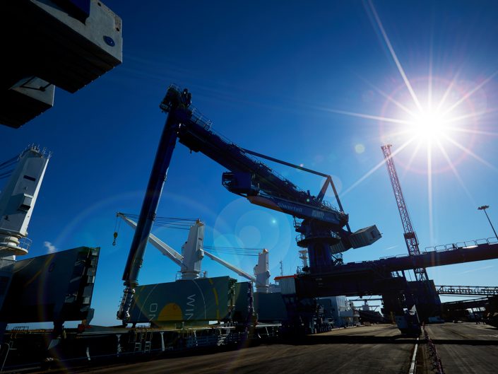 Cargo vessel discharging biomass fuel in the port of Immingham, Lincolnshire.