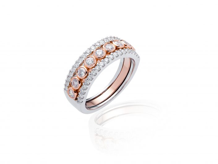 Jewellery photgraph of a Rose and White gold diamond ring on a white background.